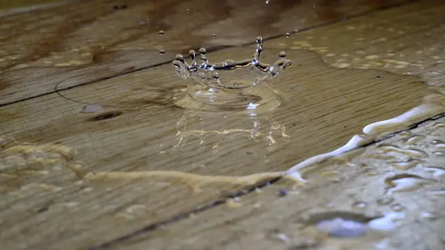 Water pooling on a wood floor